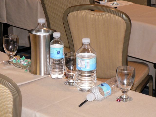 Water bottles on conference table